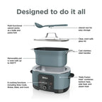 Ninja PossibleCooker Pro components, spoon-ladle, glass lid and removable oven-safe pot